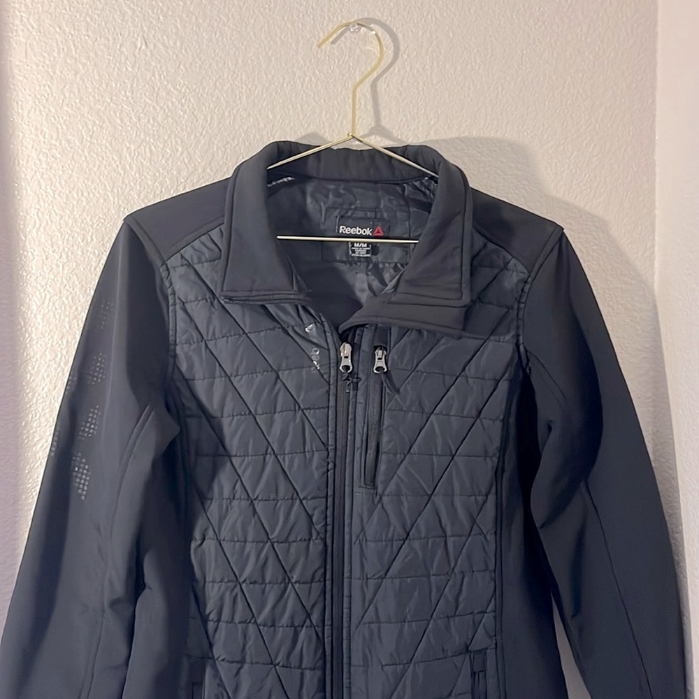 Reebok size medium black jacket.